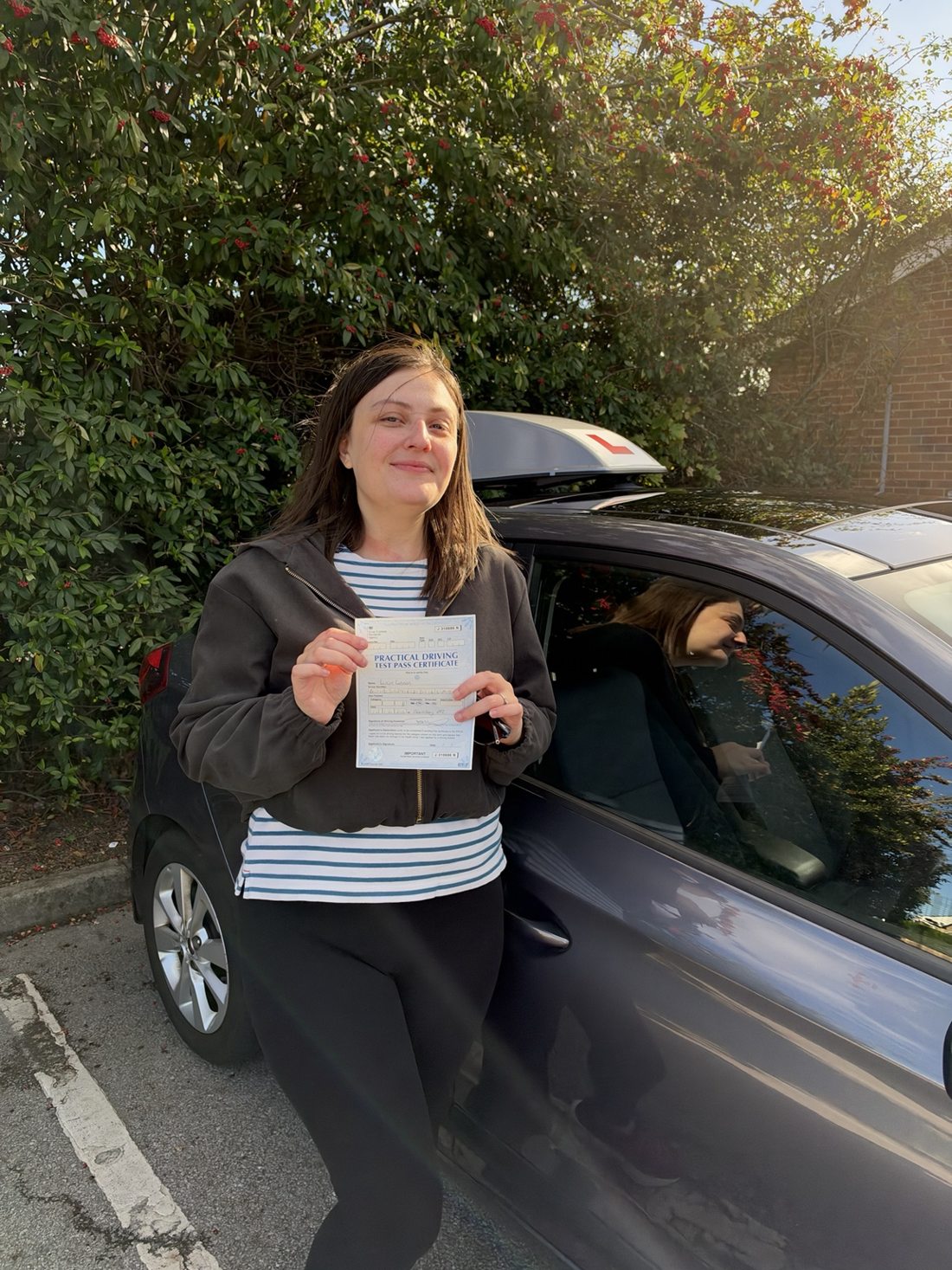 RAD Drive learner celebrating passing her practical driving test in Barnsley